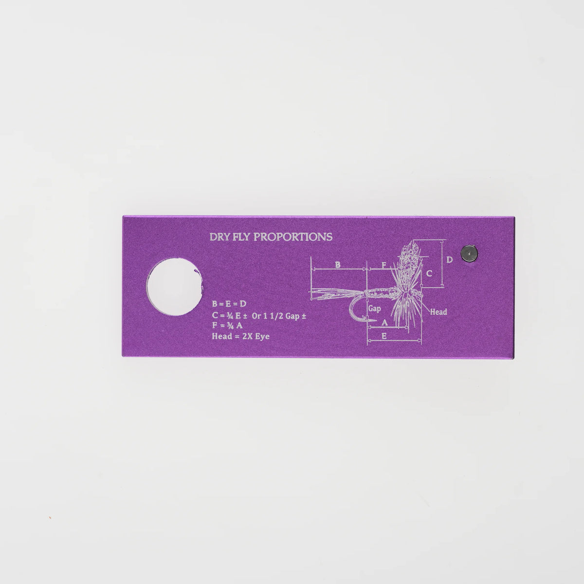 Purple reverse side with traditional dry fly proportion reference