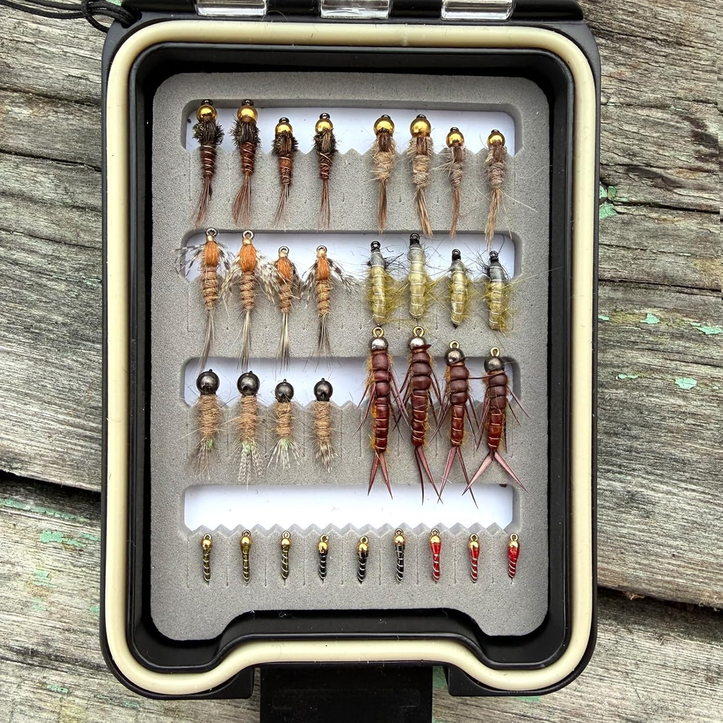 Top view of all 33 flies arranged in four rows in the foam-lined Wifreo fly box