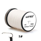 Wifreo Diffuse glitter thread No. 01, 50 yd spool and fly body example
